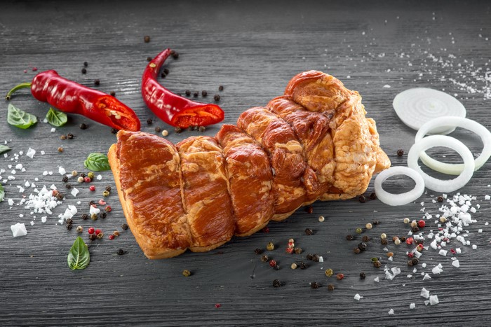 Smoked ham with chili peppers, onions, and spices