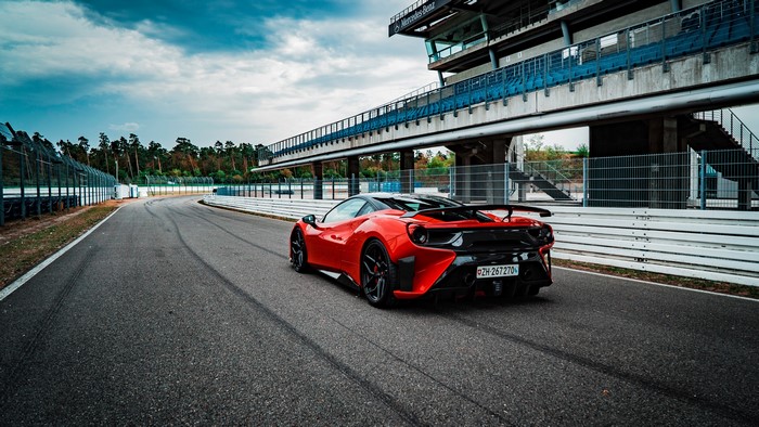 Red Ferrari 488 Pogea Racing FPlus Corsa on Track