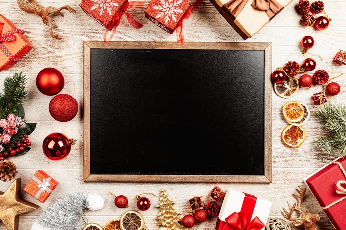 Christmas Gifts and Decorations on a Chalkboard Template