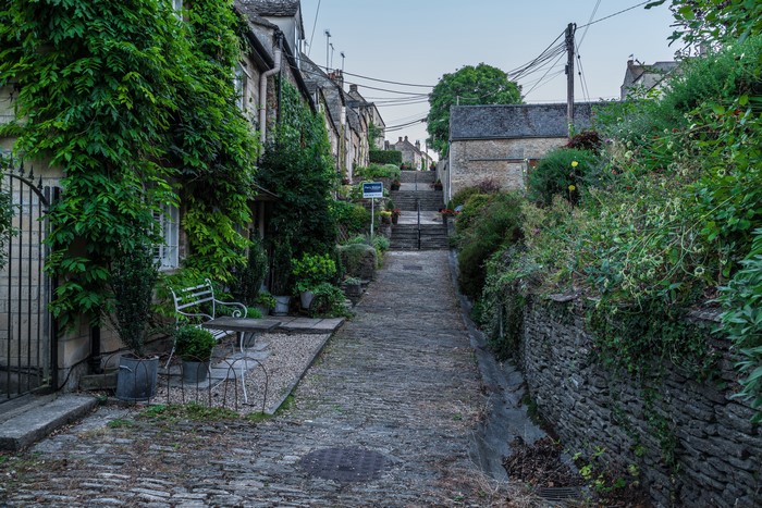 Street with houses and stairs in Tetbury, England
