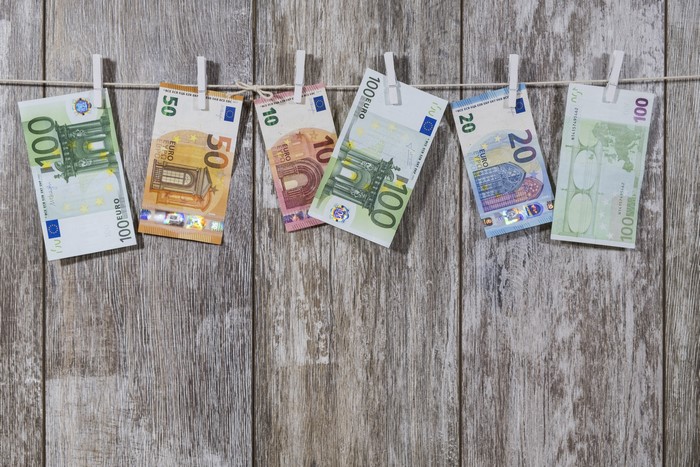 Euro banknotes drying on a clothesline