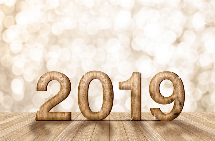 Wooden 2019 numbers on wood planks with bokeh background