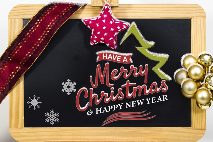 Christmas chalkboard with decorations and text