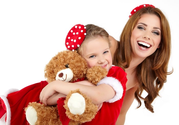 Mother and daughter with teddy bear
