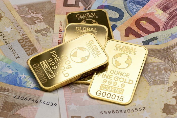 Gold ingots on Euro banknotes