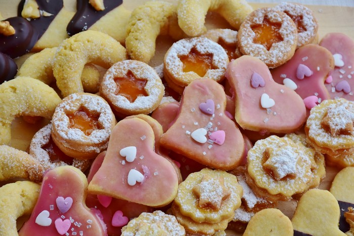 Assortment of decorated cookies with powdered sugar