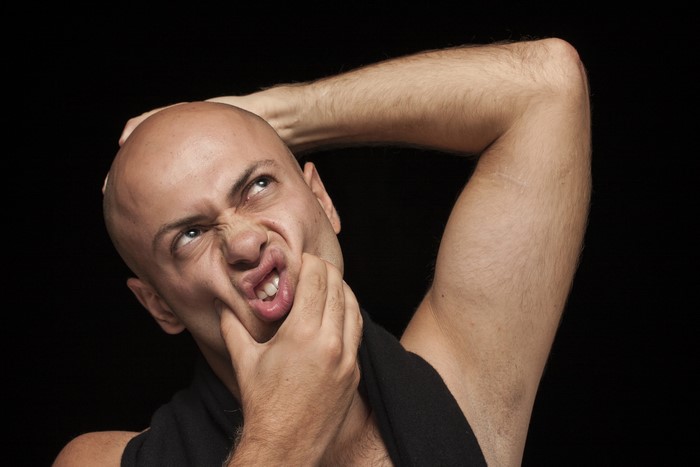 Bald Man Making a Funny Face