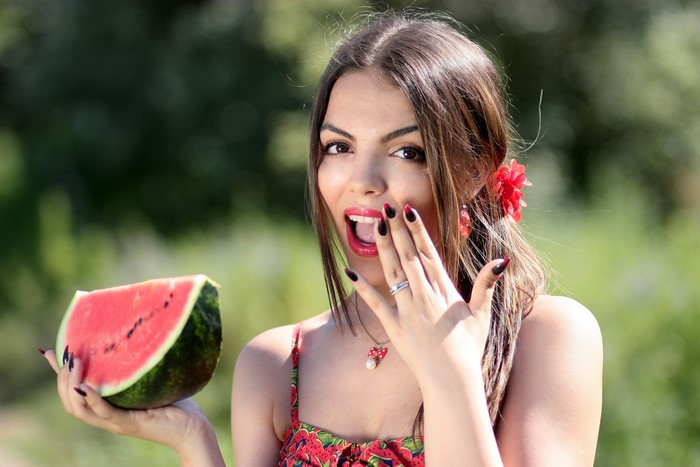 Woman with Watermelon Slice