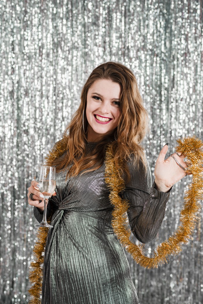 Woman with Champagne and Tinsel