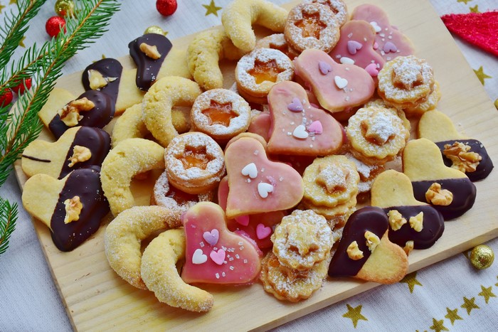 Assortment of Christmas Cookies on a Cutting Board