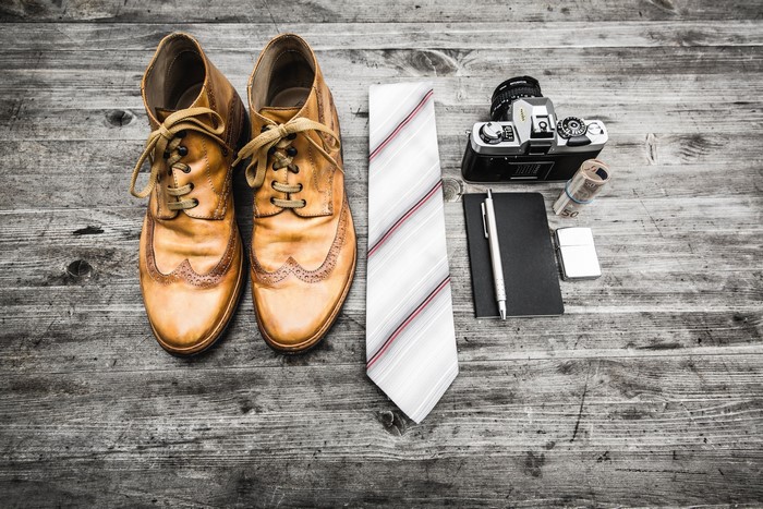 Men's accessories on wooden planks