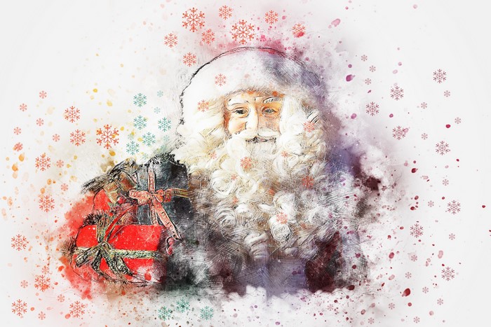 Santa Claus holding a gift with snowflakes