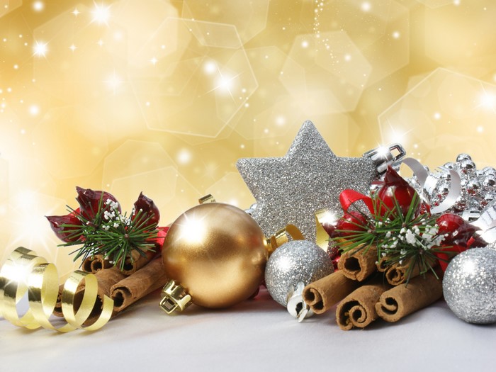Christmas ornaments with cinnamon sticks and ribbon