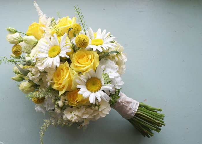 Yellow roses and daisies bouquet with white flowers