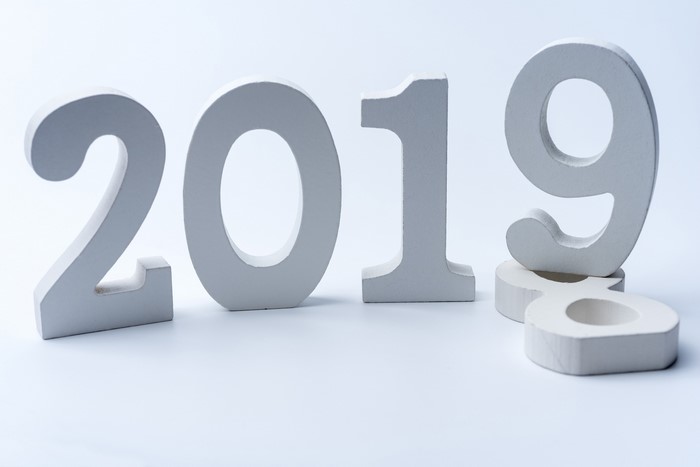White wooden numbers 2019 on white background
