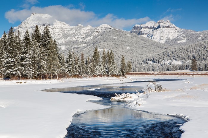 Snowy Mountains and River in Winter