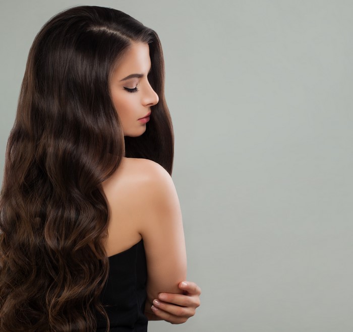 Brown haired woman with wavy hair