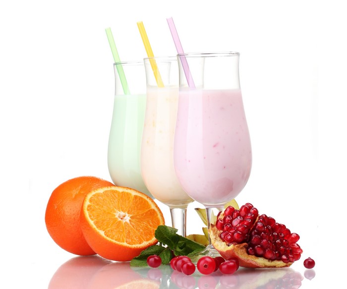 Three milkshakes with fruits