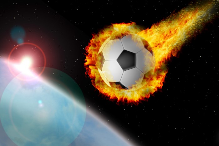 Soccer ball on fire in space