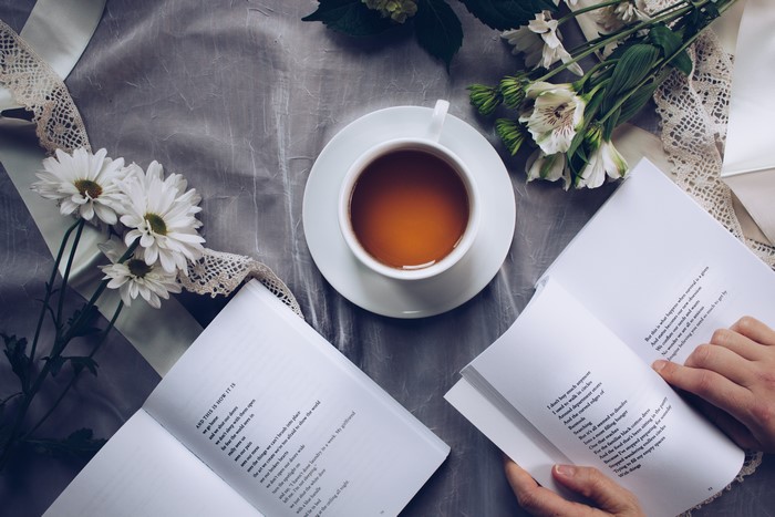 Tea cup and books with flowers
