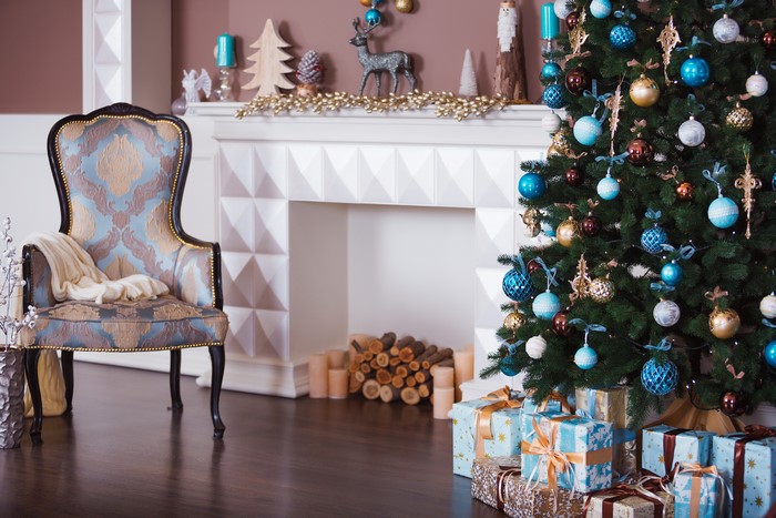 Christmas interior with armchair and tree