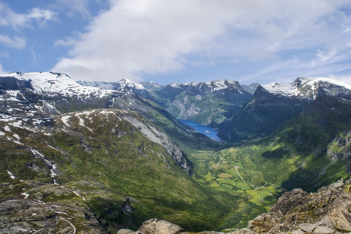 Snow-capped mountains overlooking a fjord in Norway
