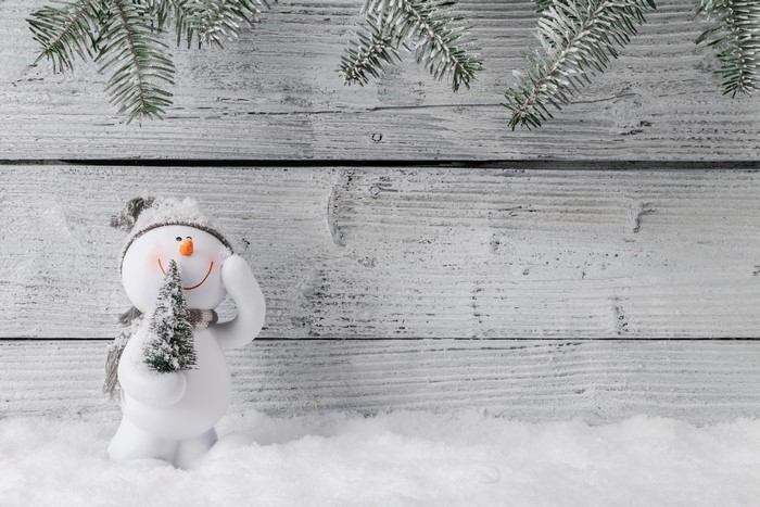 Snowman with Christmas Tree on Wood Planks