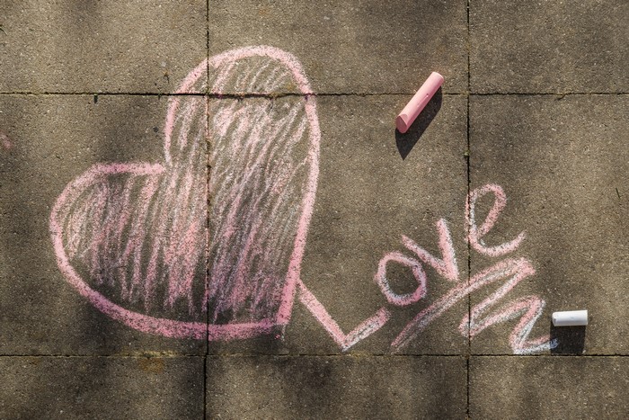 Heart and Love chalk drawing with chalk sticks