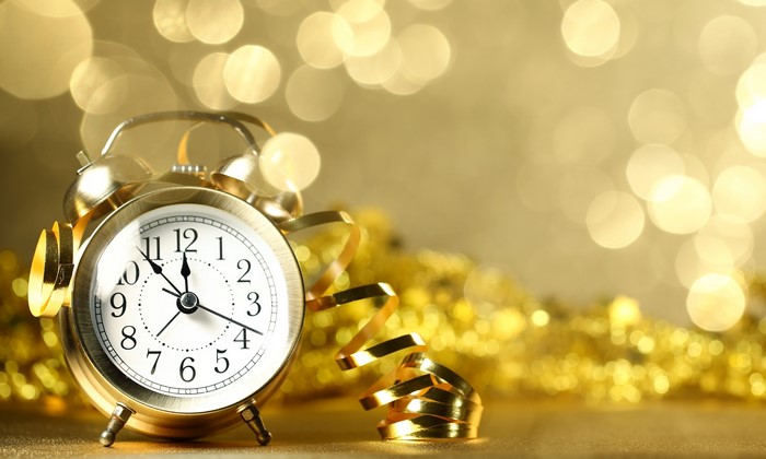 Golden Alarm Clock with Festive Decorations