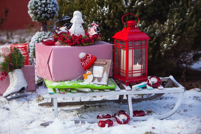 Christmas sled with gifts and lantern