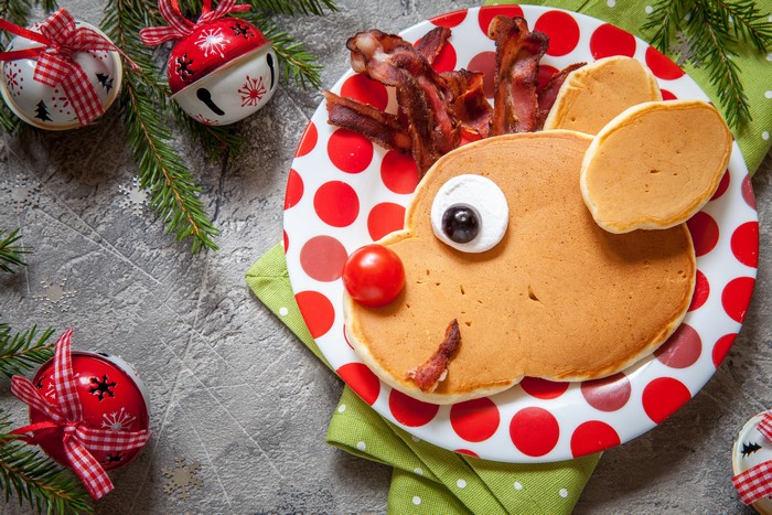 Christmas pancake reindeer with bacon and decorations