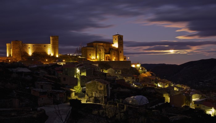 Cornago Castle and village at night, Spain