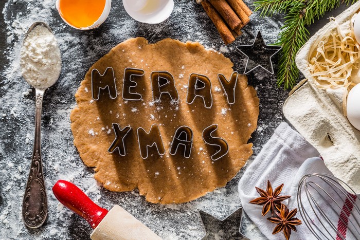 Christmas gingerbread dough with cookie cutters