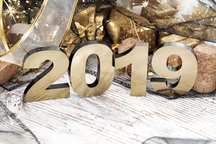 2019 New Year celebration with gold ribbon and gifts