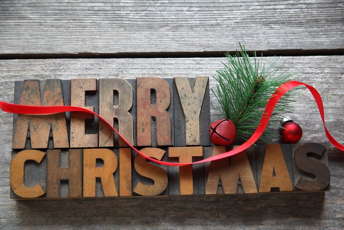 Merry Christmas wooden letters with ribbon and ornaments