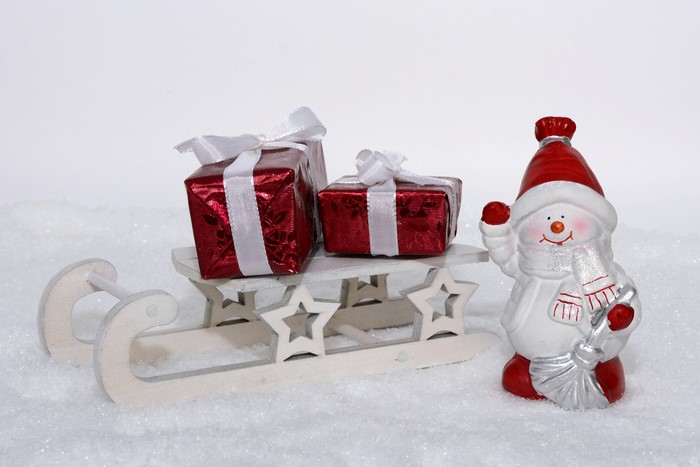 Christmas sled with gifts and snowman