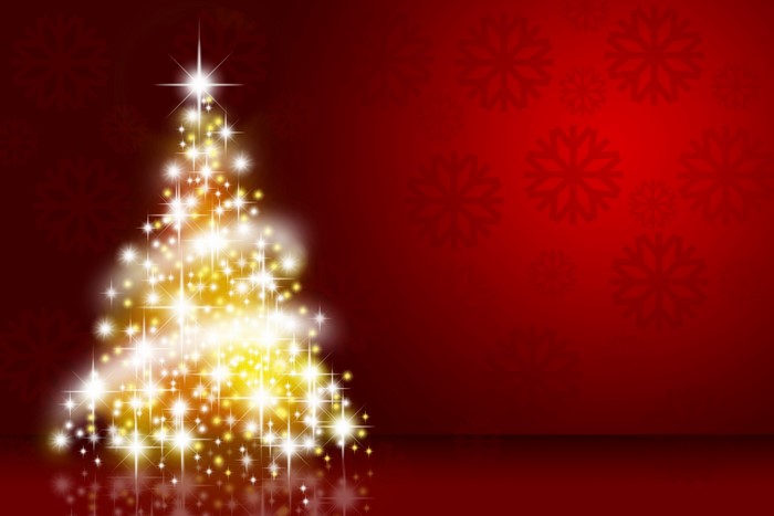 4K Christmas tree with fairy lights on red background