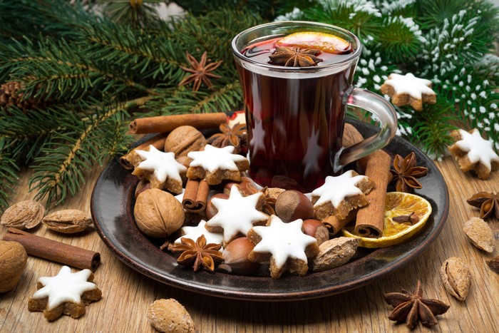 Christmas mulled wine with cookies and nuts