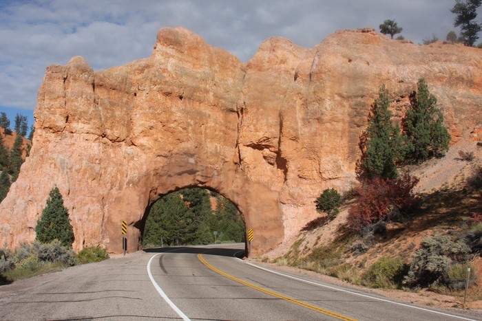 Red Arch Road through a rock formation in Utah, USA