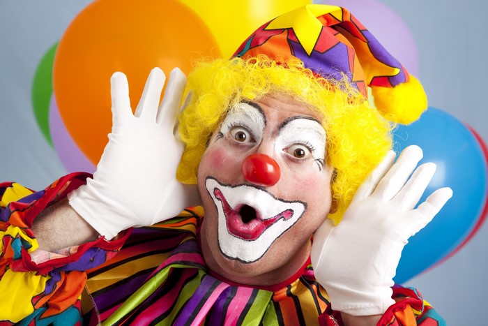Colorful 4K Clown with Yellow Wig and White Gloves