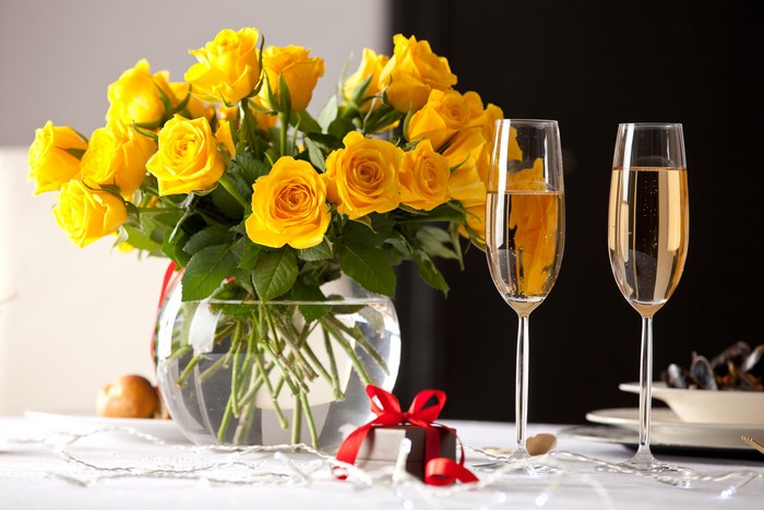 Yellow Roses in Vase with Champagne and Gift
