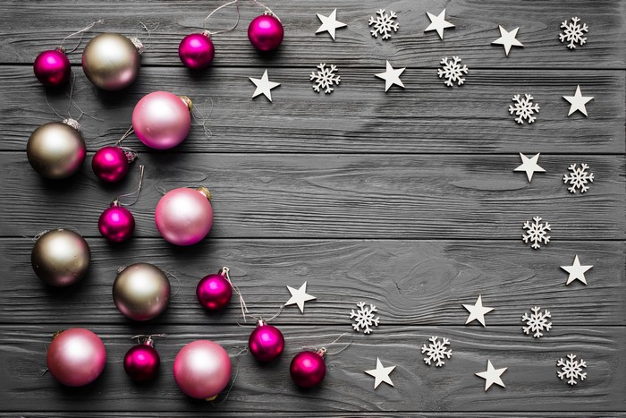 Christmas ornaments and decorations on wood planks