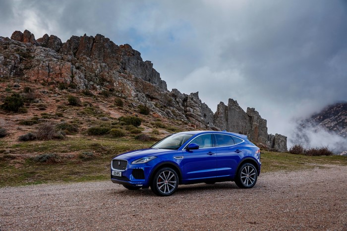 Blue Jaguar E-Pace P300 AWD R-Dynamic in rocky landscape