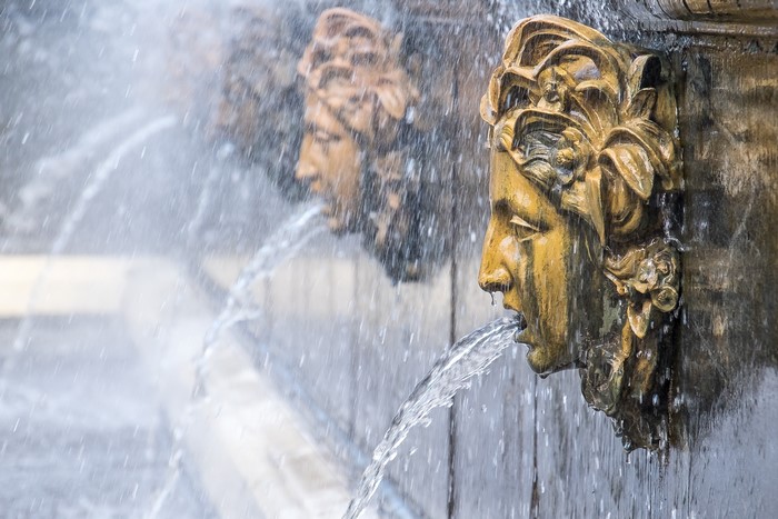 Fountain heads with water splashing in Peterhof, St. Petersburg