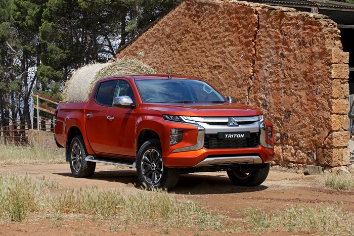 Orange Mitsubishi Triton Pickup Truck