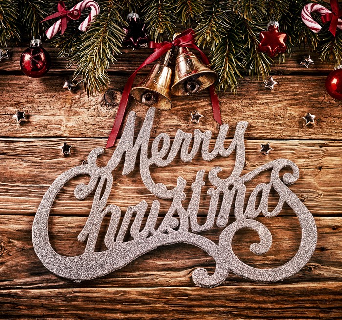 Merry Christmas sign with bells and ornaments