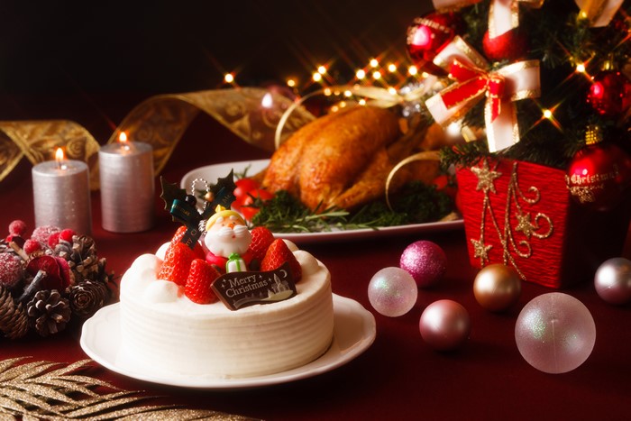Christmas cake with roasted turkey and decorations