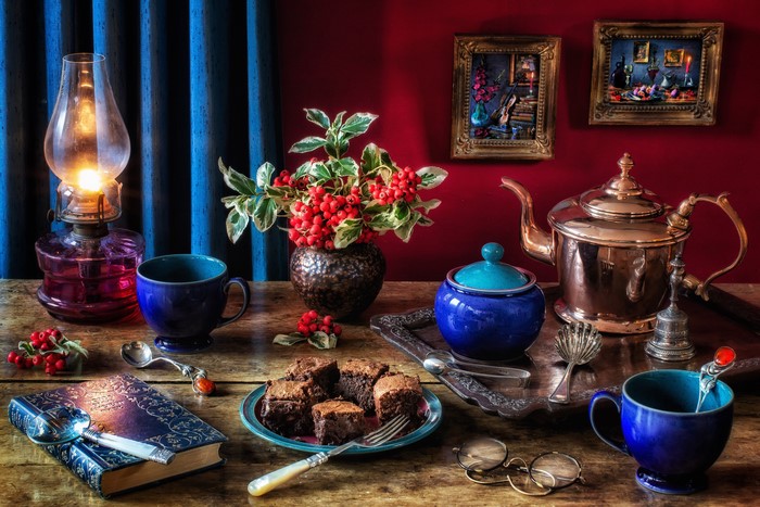 Still-life with Kerosene lamp, kettle, and brownies