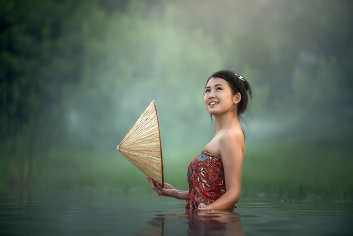 4K Portrait of Smiling Brunette Girl in Water