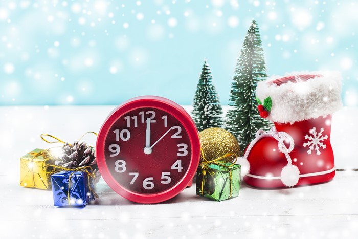 Christmas clock with gifts and trees